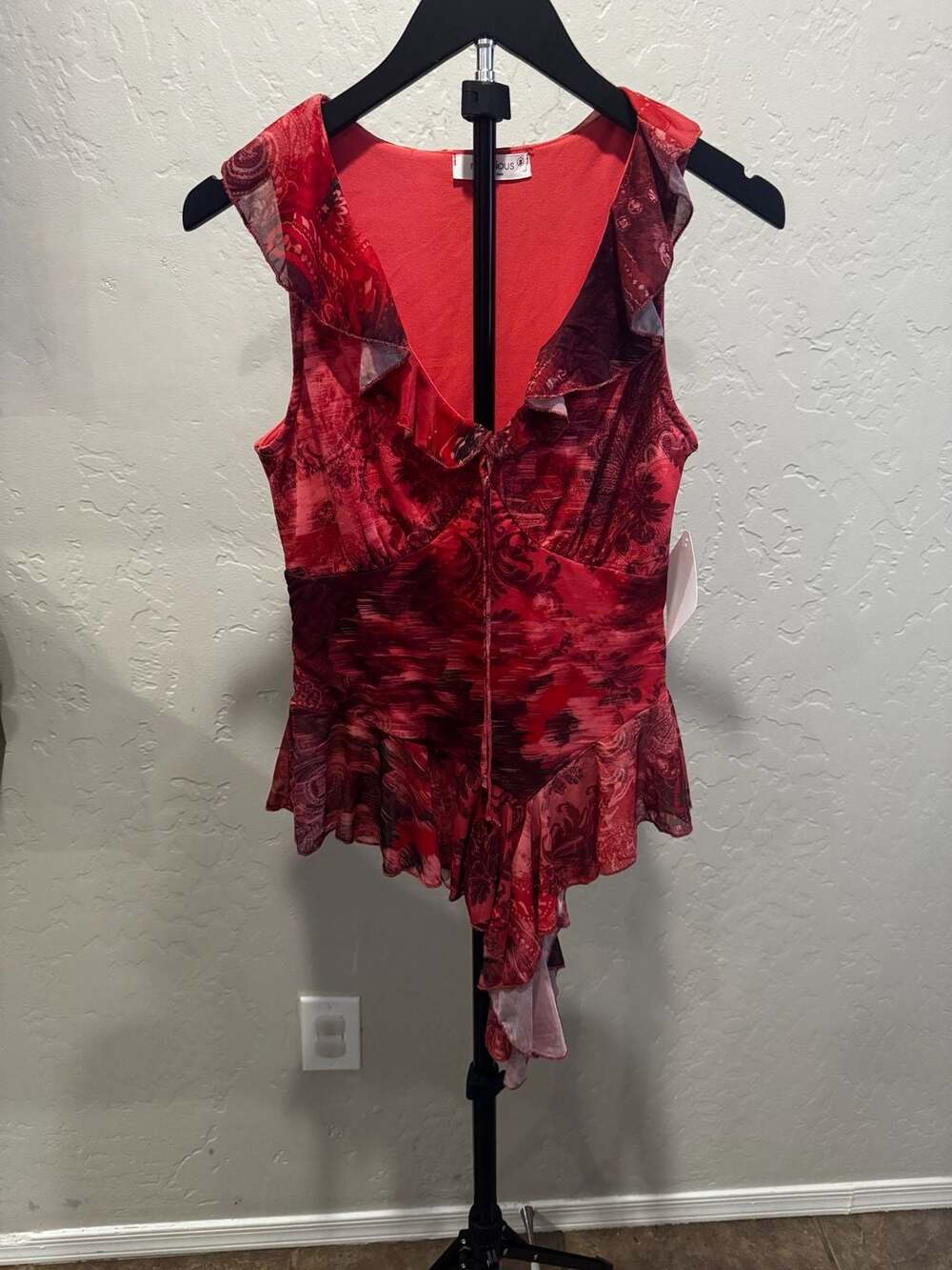 Rebellious Women's Red Paisley Print Asymmetrical Ruffle Sleeveless Peplum Top